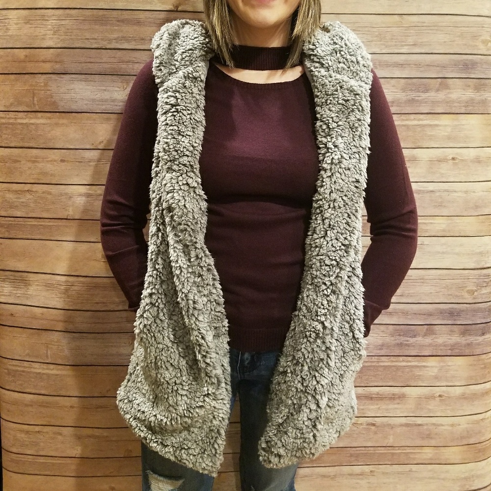 Grey hooded Sherpa vest.